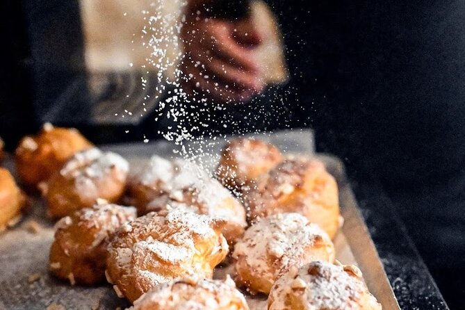 Authentic Parisian Gourmet Food Tour with 10 Local Dishes & Wines - Notre Dame: pastries, oysters, galettes, and central Paris