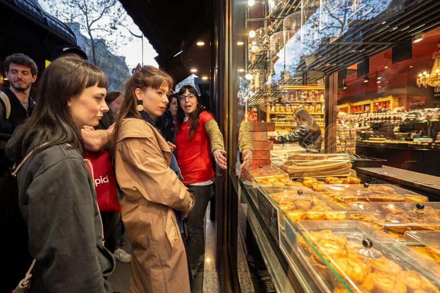 Boho Nights in Paris: A Magical Evening Tour - Entering the Latin Quarter by Rue de la Huchette