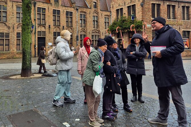 Bruges Guided Day Tour from Paris with Canal Cruise - Entering Bruges through its medieval center
