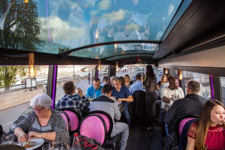 Bus Toqué Champs Elysées Tour w/ 3-Course Dinner & Champagne - Following 96 sights on your table tablet