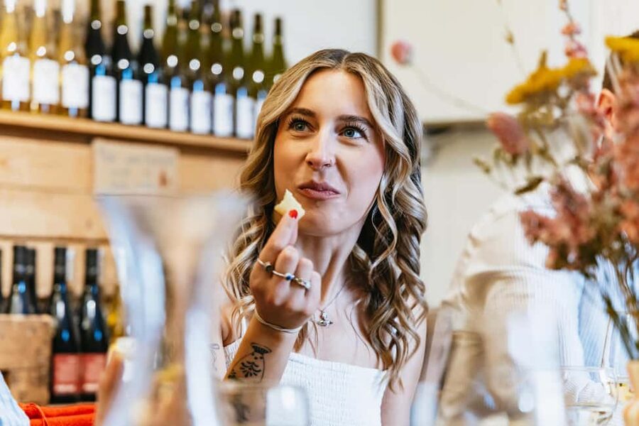 Cheese & Wine Tasting in Montmartre with Local Cheesemonger - A stone-walled tasting room in Montmartre