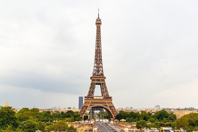 Eiffel Tower Guided Tour by Stairs with Optional Summit by Lift - Walking through the Eiffel Tower’s first floor