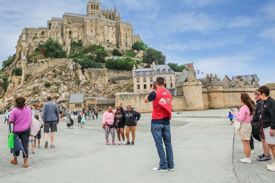 From Paris: Full-Day Mont Saint-Michel Guided Tour - Meeting at the Eiffel Tower and settling into the coach