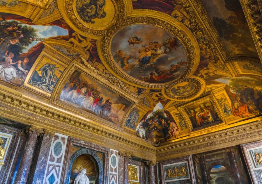 From Paris: Versailles Palace and Gardens Guided Day Trip - The Hall of Mirrors and royal court stories