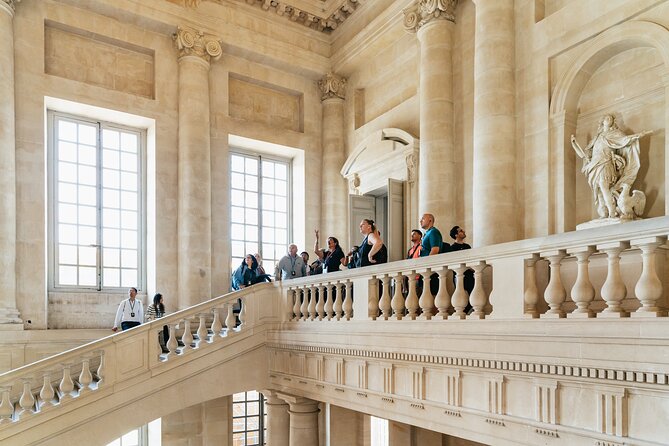From Paris: Versailles Palace Live Tour with Gardens Access - The bus from Paris and meeting point