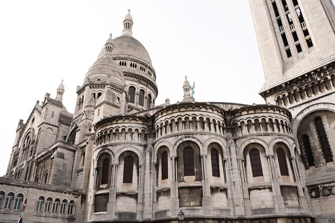 Hidden Montmartre: Paris' Secret Streets Walking Tour - Montmartre’s vineyard and the tale of Lolo