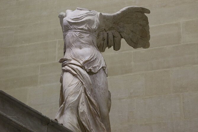 Louvre Museum Access Guided Tour with Mona Lisa - The Mona Lisa and its famous smile