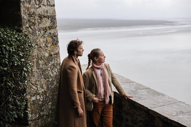Mont Saint Michel Guided Day Trip with Abbey Entry from Paris - Walking the fortifications with a guide