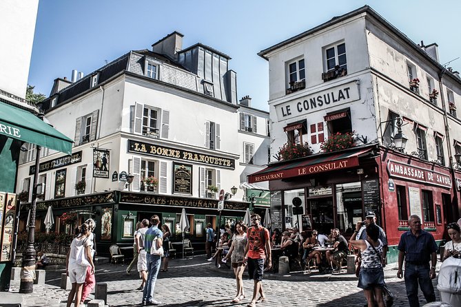 Montmartre District and Sacre Coeur - Exclusive Guided Walking Tour - Au Lapin Agile and Montmartre’s bohemian past