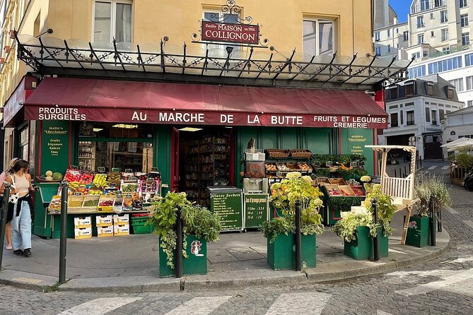 Montmartre Hill French Gourmet Food and Wine Tasting Walking Tour - Starting beneath Montmartre at the Moulin Rouge