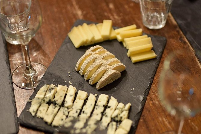 Paris Art of Pairing Cheese and Wine Tasting in a Cheese Cellar - What the $84.69 price includes