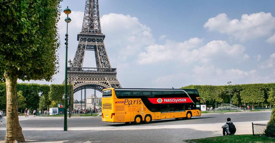 Paris: Audio-Guided Bus Tour & Seine River Cruise - The coach tour: Paris through a moving window