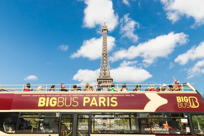 Paris Big Bus Open Top Panoramic Night Tour - Champs-Élysées, Arc de Triomphe, and the city’s grand scale