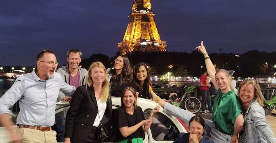 Paris: City Sightseeing Tour at Night in Vintage Car - The Eiffel Tower begins the visual show