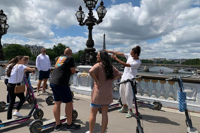 Paris City Tour by E-Scooter with Fun Guide (Small groups) - Notre-Dame and the ride back