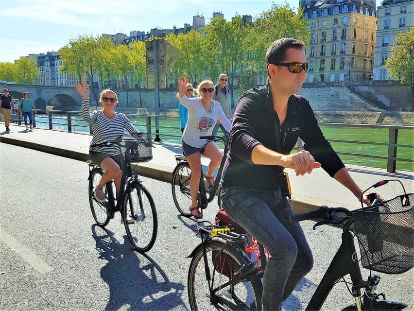 Paris: City Treasures Bike Tour - Meeting point, timing, and cancellation terms