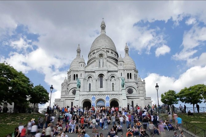 Paris Eiffel Tower, Notre Dame, Louvre and Montmartre Guided Tour - Montmartre: artists, windmills, and a big city view