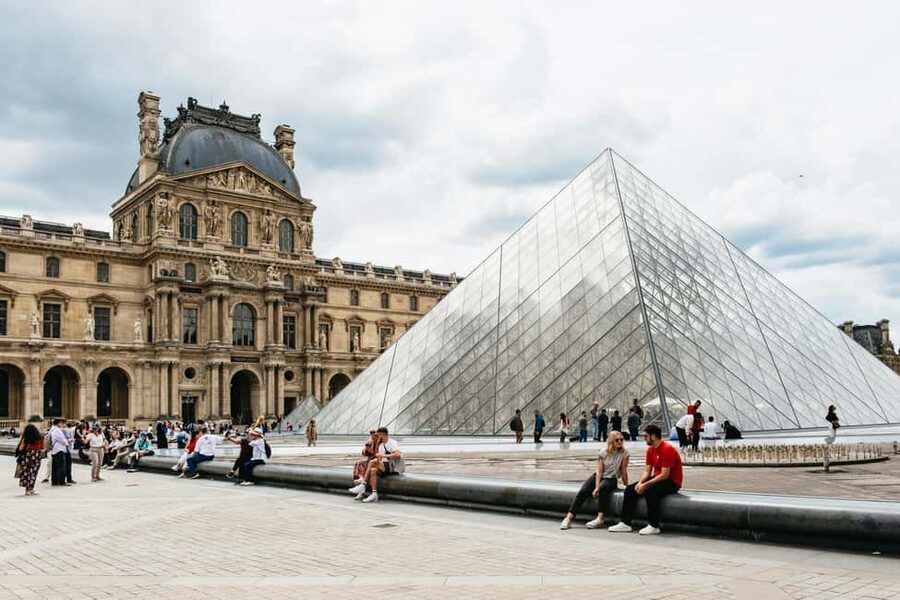 Paris: Emily TV Show Locations Guided Walking Tour - Musée de la Monnaie, fashion, and Parisian treasures