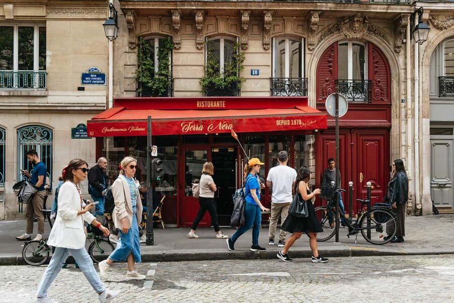 Paris: Emily TV Show Locations Guided Walking Tour - Crossing Pont des Arts above the Seine