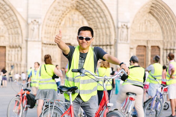 Paris Evening Snapshot Bike Tour - Pont des Arts, the Académie Française, and the Louvre courtyards