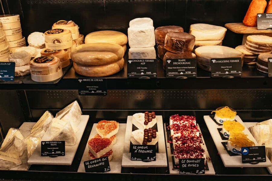 Paris: Gourmet Food Tour with Over 10 Tastings and Wine - The Louvre-area cheese stop