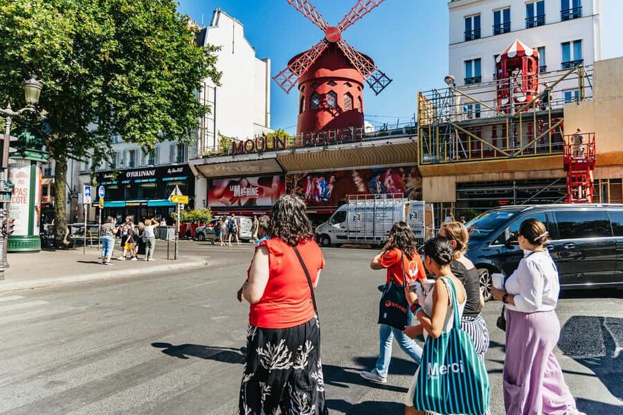 Paris: Hidden Gems of Montmartre with Local Guide - Moulin de la Galette and the old village atmosphere