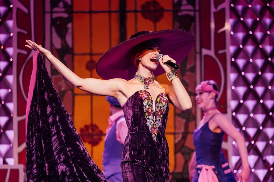 Paris: La Nouvelle Eve Cabaret Show with Champagne - Seating in a small, intimate room