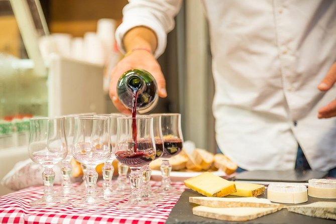 Paris Le Marais District Original Food and Wine Tasting Tour - Cheese, bread, wine, and the first tasting stops