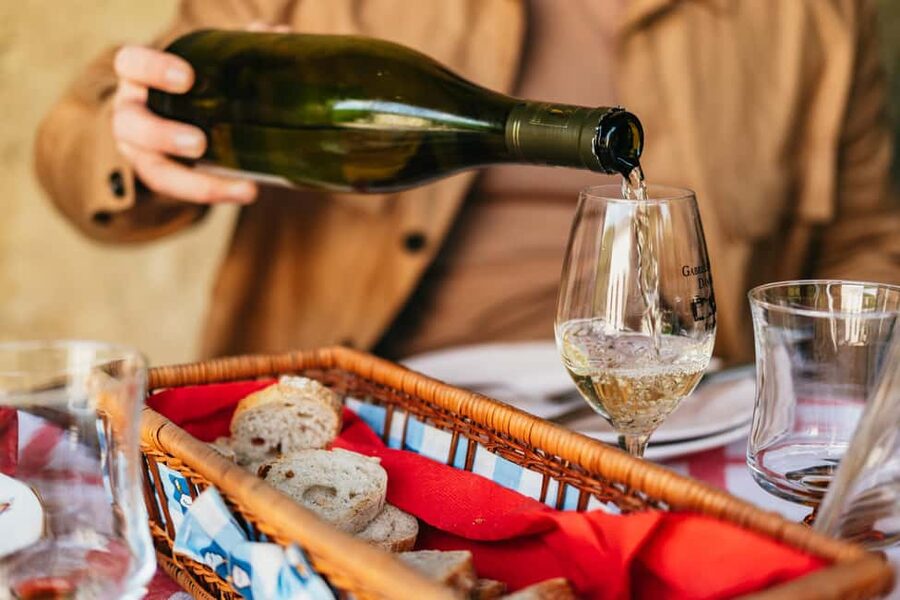 Paris: Loire Valley Chambord Castle, Wine Tasting & Lunch - Wine tasting in family-run cellars
