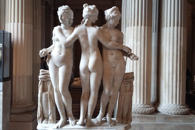 Paris: Louvre Museum Tour Mona Lisa & Iconic Masterpieces - Entering through the pyramid