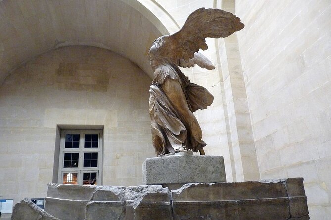Paris: Louvre Museum Tour Mona Lisa & Iconic Masterpieces - Winged Victory on the Daru staircase