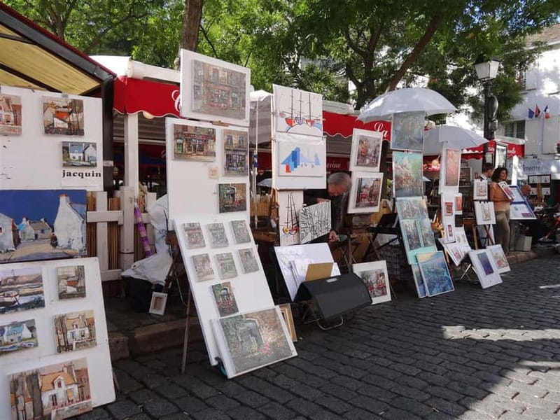 Paris Montmartre: 2-Hour City Tour in German - Moulin de la Galette and the artists’ Montmartre