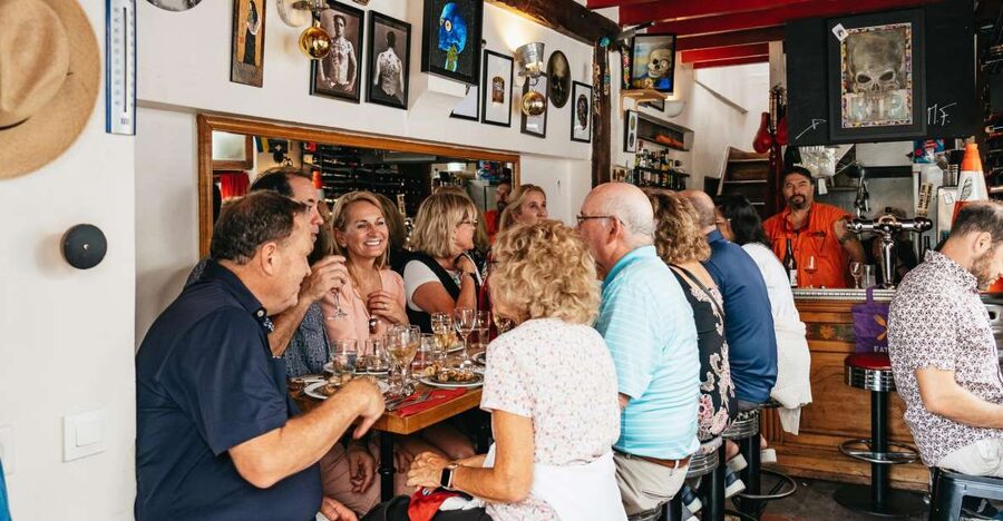 Paris: Montmartre Food and Wine Guided Tour - Baguette, cheese, and charcuterie in Montmartre