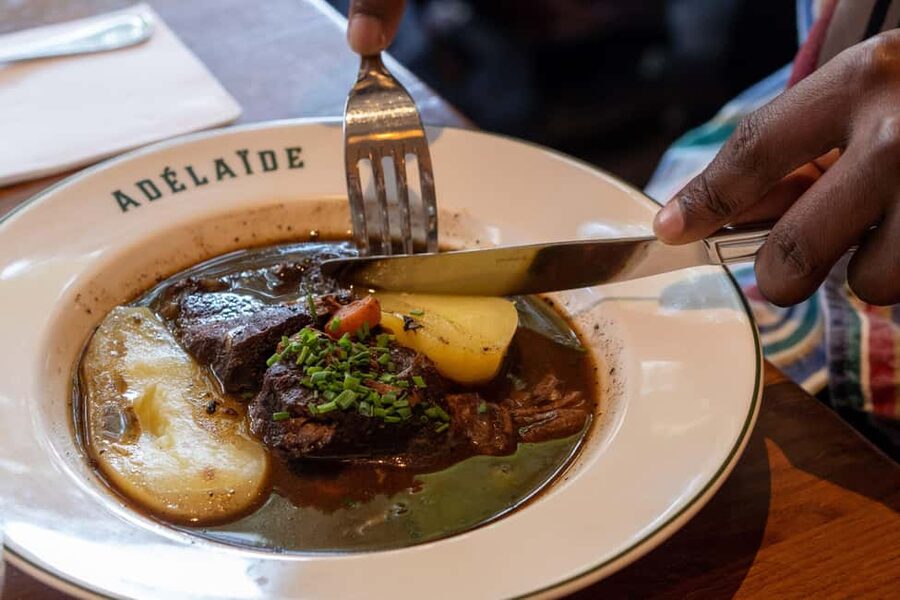 Paris: Montmartre Food Tour with Full Meal - What the food adds to the sightseeing