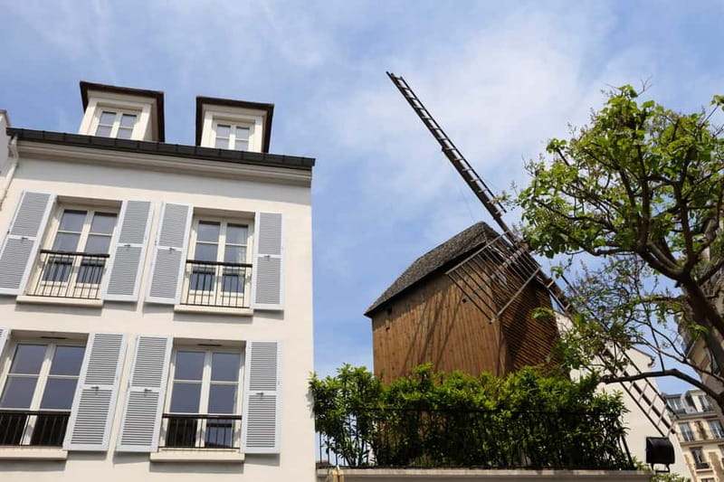 Paris: Montmartre Hidden Gems and Highlights Walking Tour - Rue des Abbesses and the neighborhood between sights