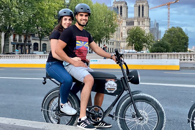 Paris Sightseeing Family Friendly Guided Electric Bike Tour - Place Vendôme and the Louvre: a grand opening
