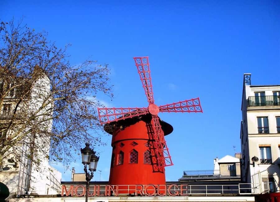 Paris: Walking Tour of Montmartre - The Moulin Rouge and the secrets behind the red windmill
