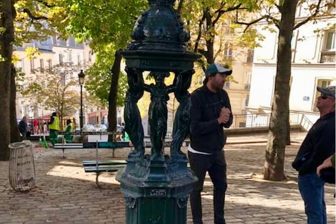 See 15+ Top Sights Paris Tour with Fun Guide, (Walking and Metro Tour) - Arc de Triomphe and the Champs-Élysées view