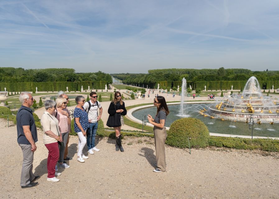 Versailles: Skip-the-Line Versailles Palace and Gardens Tour - Walking into the formal gardens